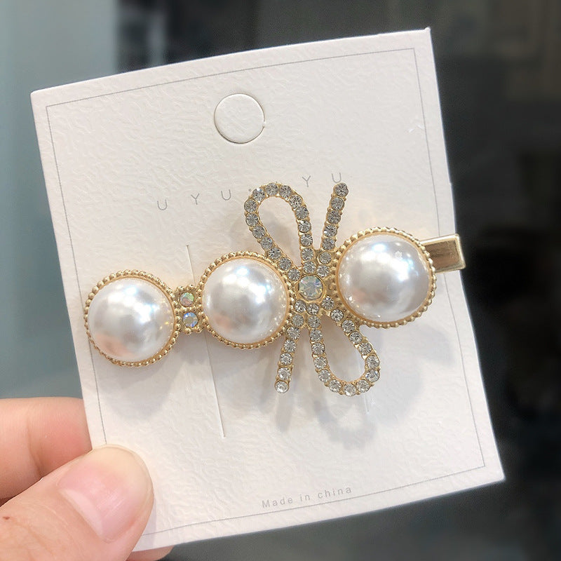 Wholesale Pearl Studded Diamond Bow Hair Clips