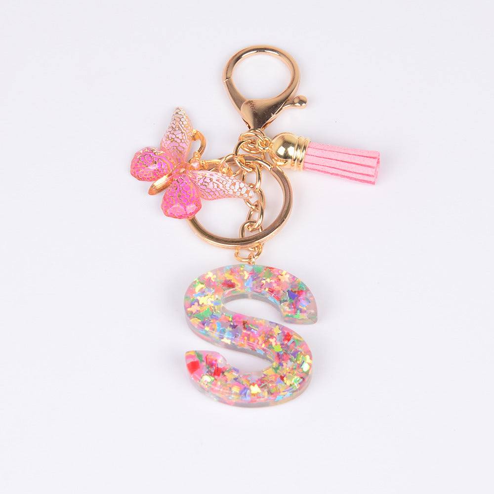 卸売スパンコール英語蝶タッセル文字樹脂キーホルダー