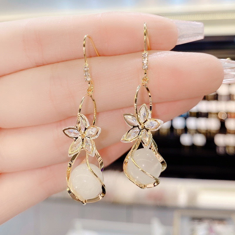 Wholesale Zircon Five Petal Flower Cat Eye Stone Personalized Fashion Temperament Earrings