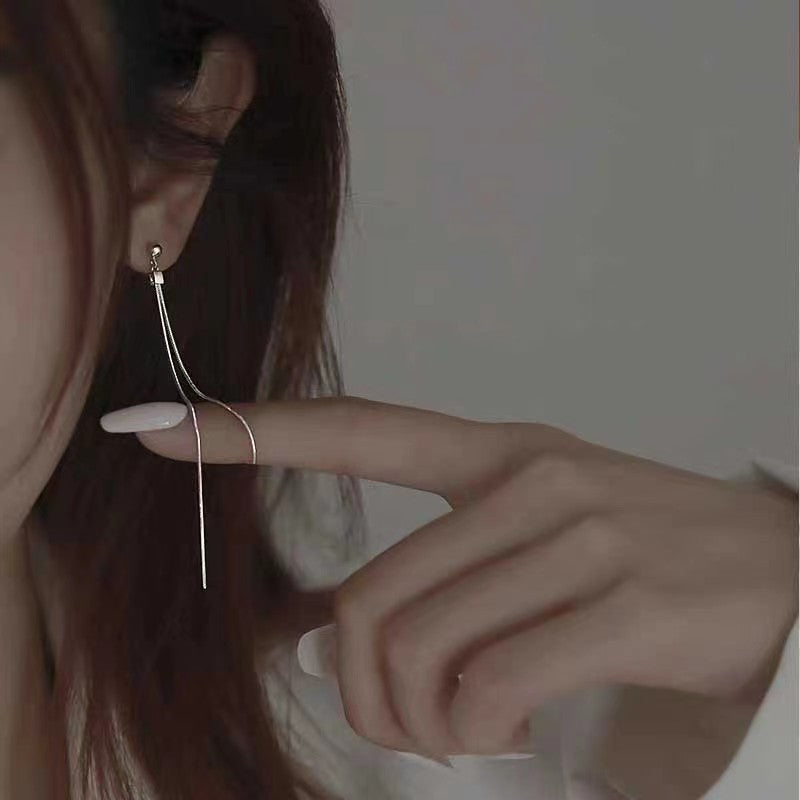 Wholesale Temperament long round face slim galaxy tassel earrings