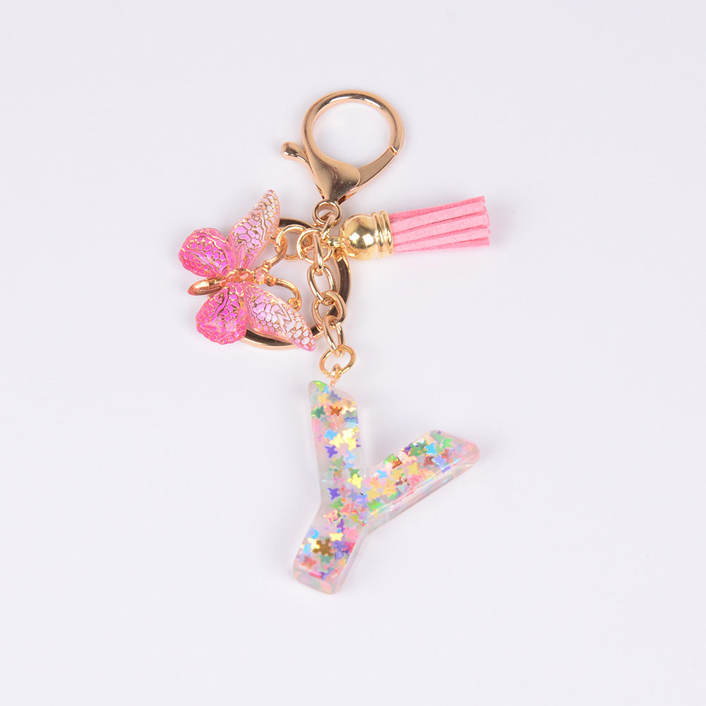卸売スパンコール英語蝶タッセル文字樹脂キーホルダー