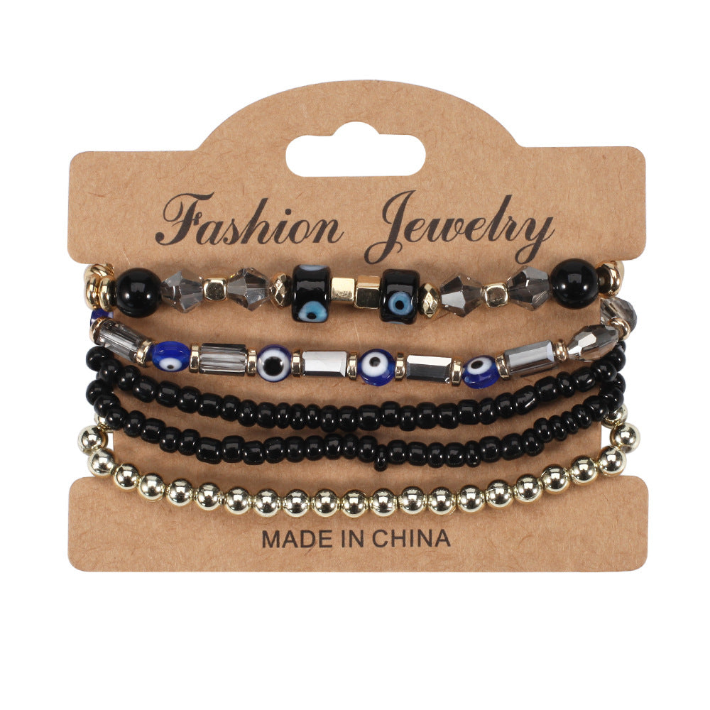 Wholesale Bohemian Eye Pattern Rice Beads Multi-layer Bracelet