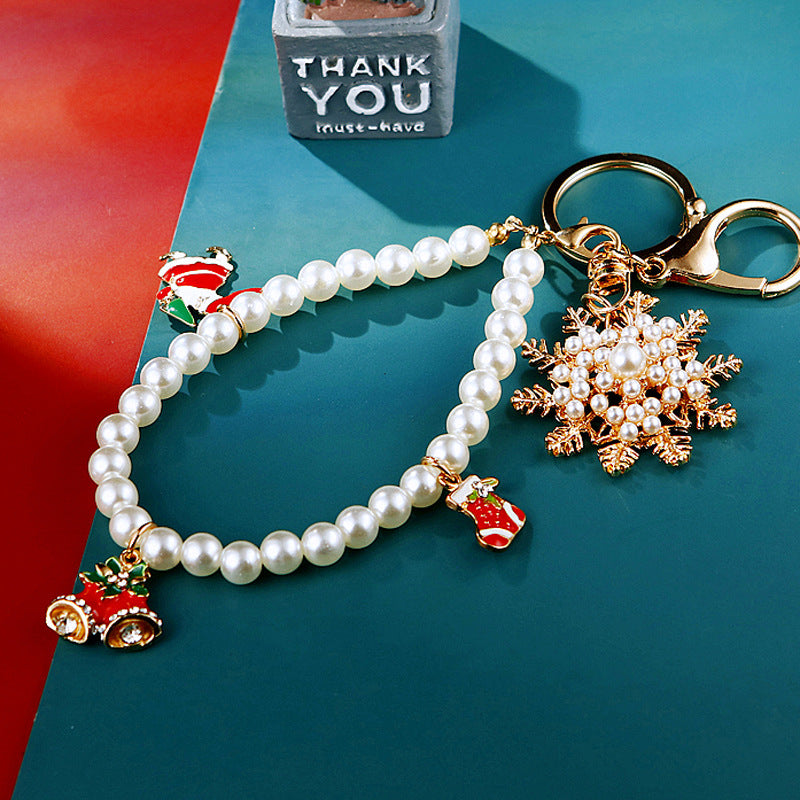 Wholesale Diamond Inlaid Christmas Snowflake Pearl Metal Keychain