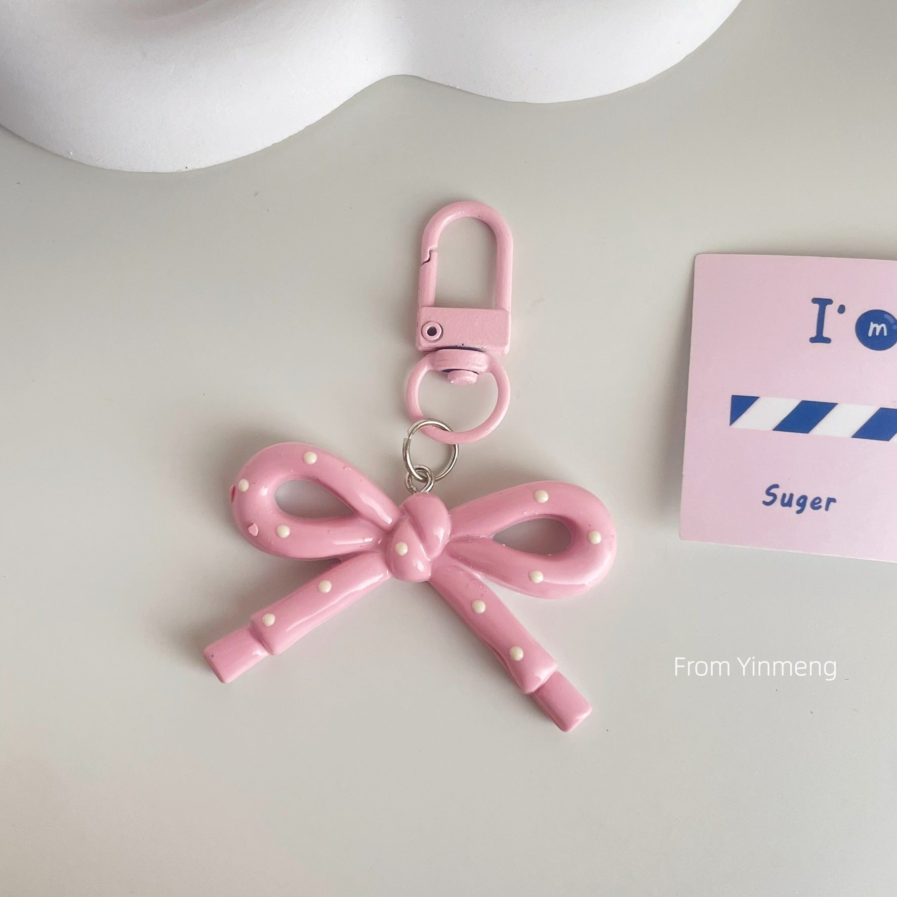 Wholesale spring and summer candy-colored hollow butterfly bow keychain