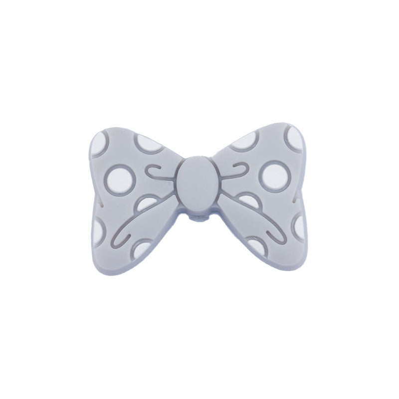 Wholesale 10PCS Silicone Bow Knot Grinding Teeth Cartoon Beads