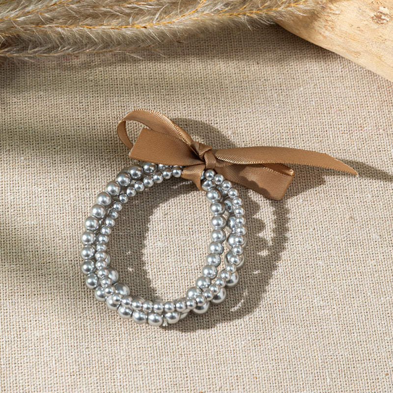 Wholesale Bow colored pearl Layered Bracelet Set