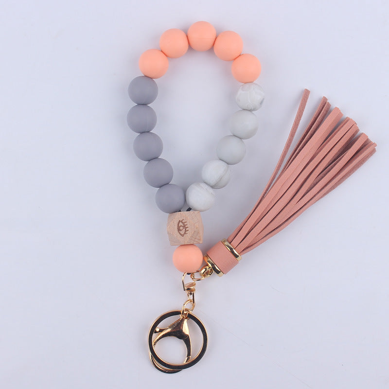 Wholesale Leopard Pattern Silicone Tassel Beaded Wrist Keychain