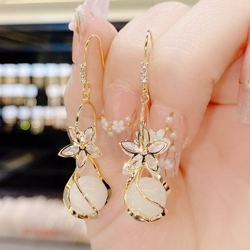 Wholesale Zircon Five Petal Flower Cat Eye Stone Personalized Fashion Temperament Earrings