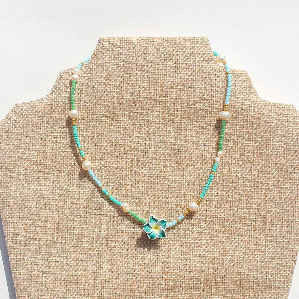 Wholesale Beach Bohemian Holiday Style Plumeria Flower Rice Bead Necklace