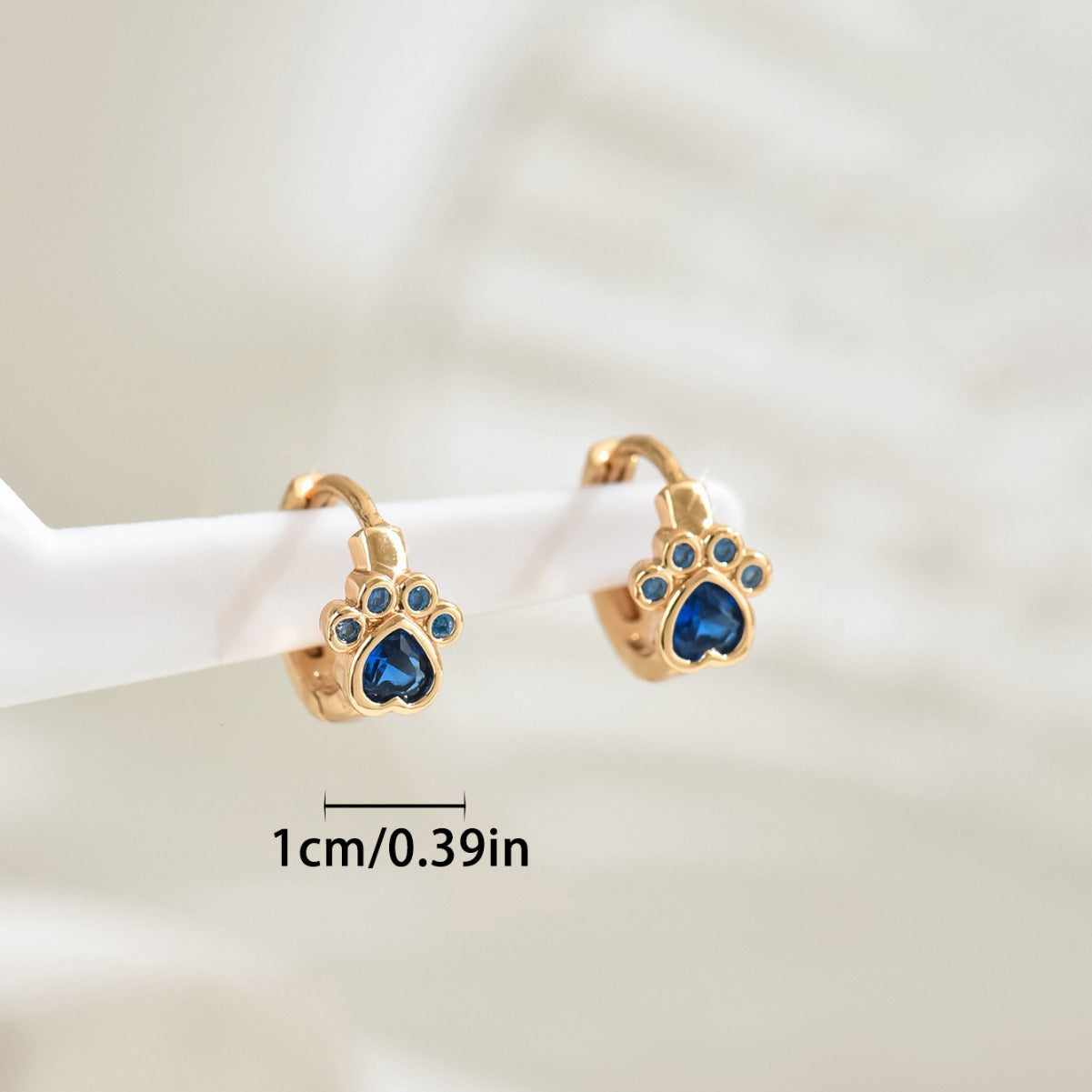 Wholesale Simple Bear Claw Inlaid Blue Diamond Copper Zircon Earrings