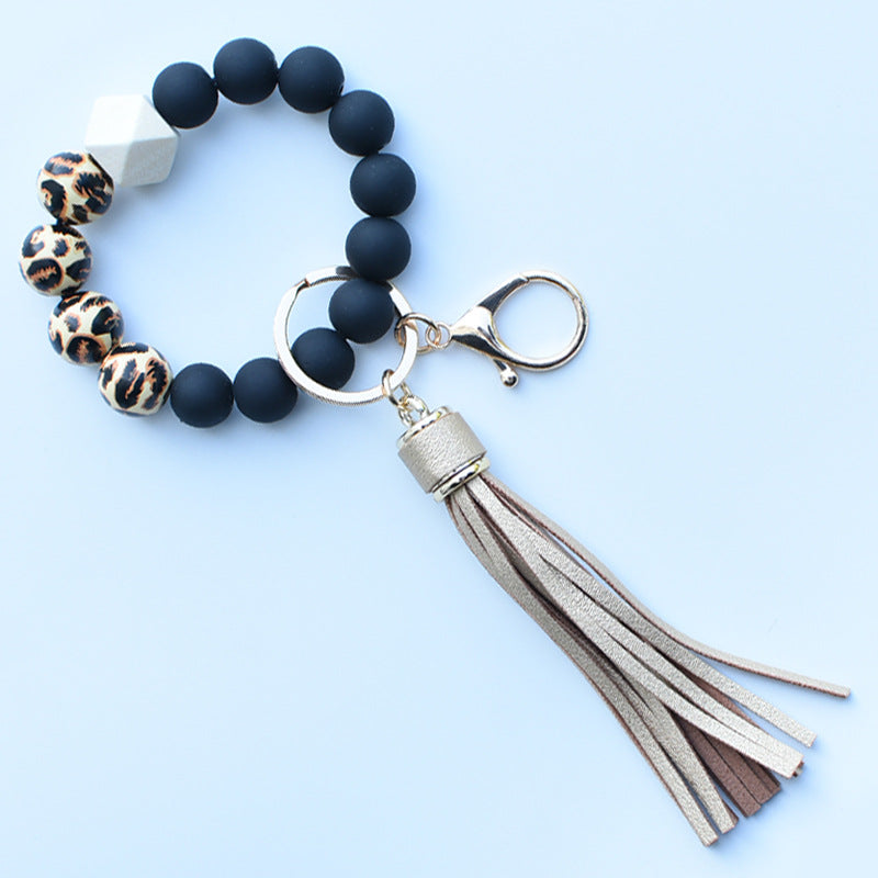 Wholesale Colorful leopard print silicone beaded bracelet keychain PU tassel pendant