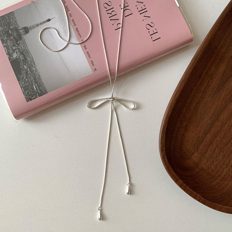 Wholesale Simple bow pull-out long necklace sweater chain