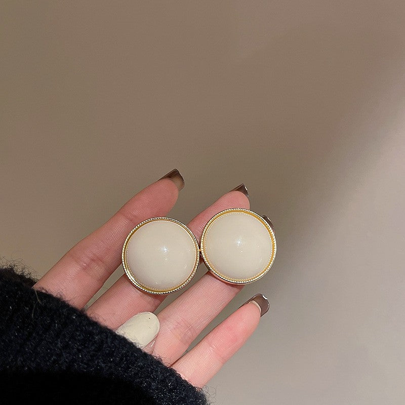 Wholesale of Medieval Round Flower Tassel Metal Earrings