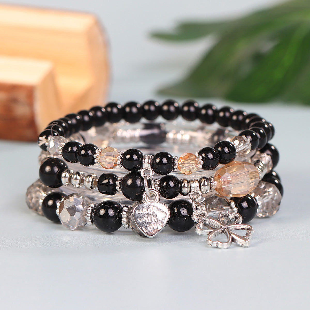 Wholesale Four Leaf Grass Heart Multi Layered Pendant Glass Elastic Bracelet