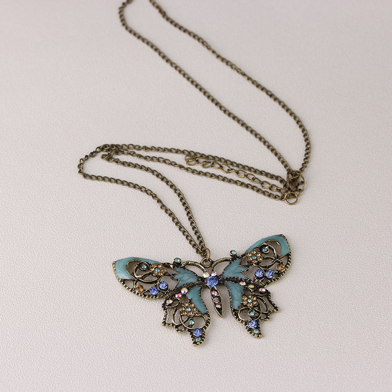 Wholesale Vintage Hollow Oil Dripping Butterfly Alloy Sweater Chain