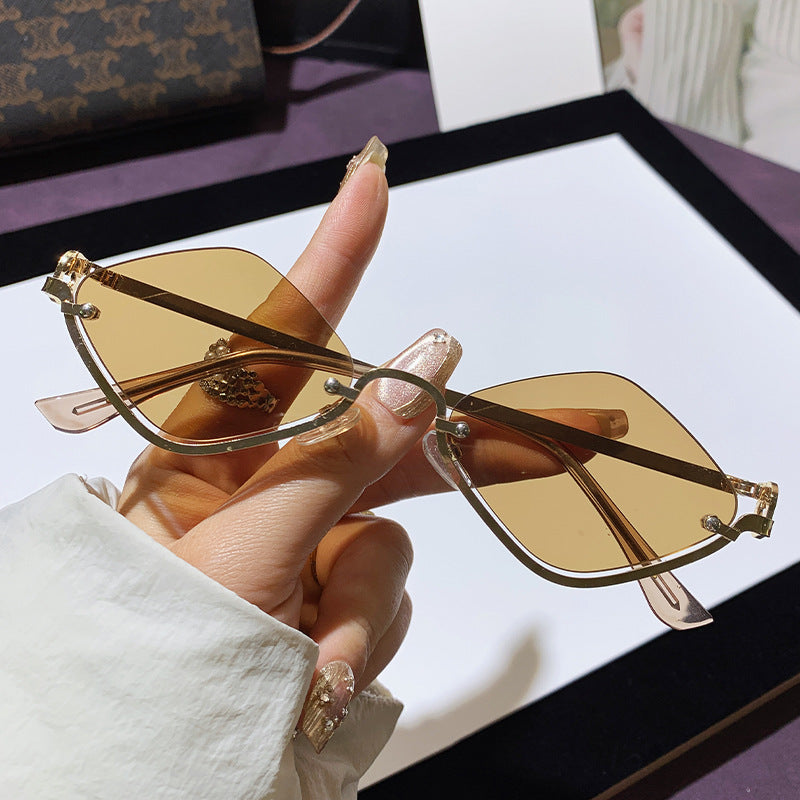 Wholesale Fashion half frame diamond sunglasses metal high-end sense 2025 new small frame modern trend catwalk European and American sunglasses