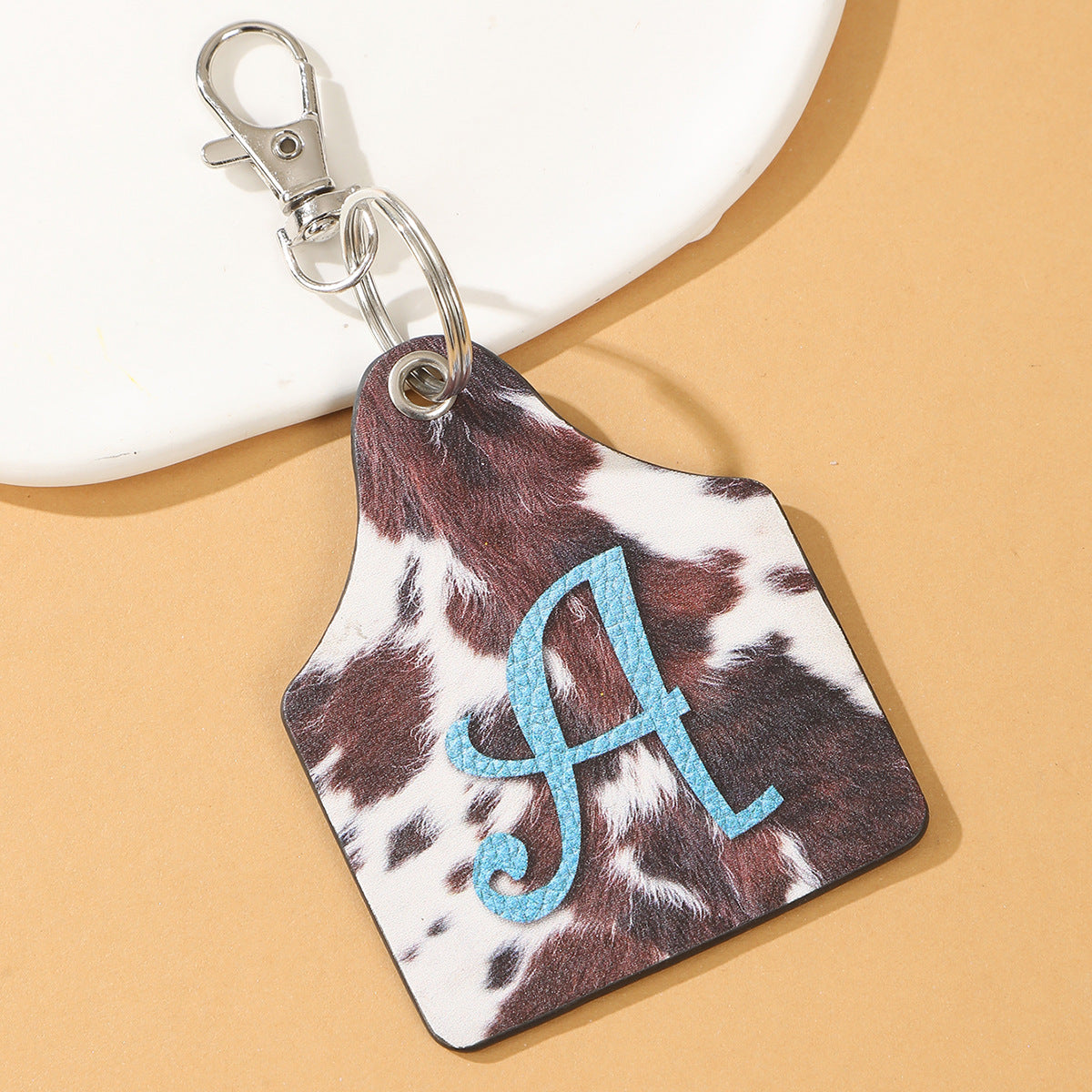 Wholesale Cow Print Animal Fur Letter A Printed Leather Keychain