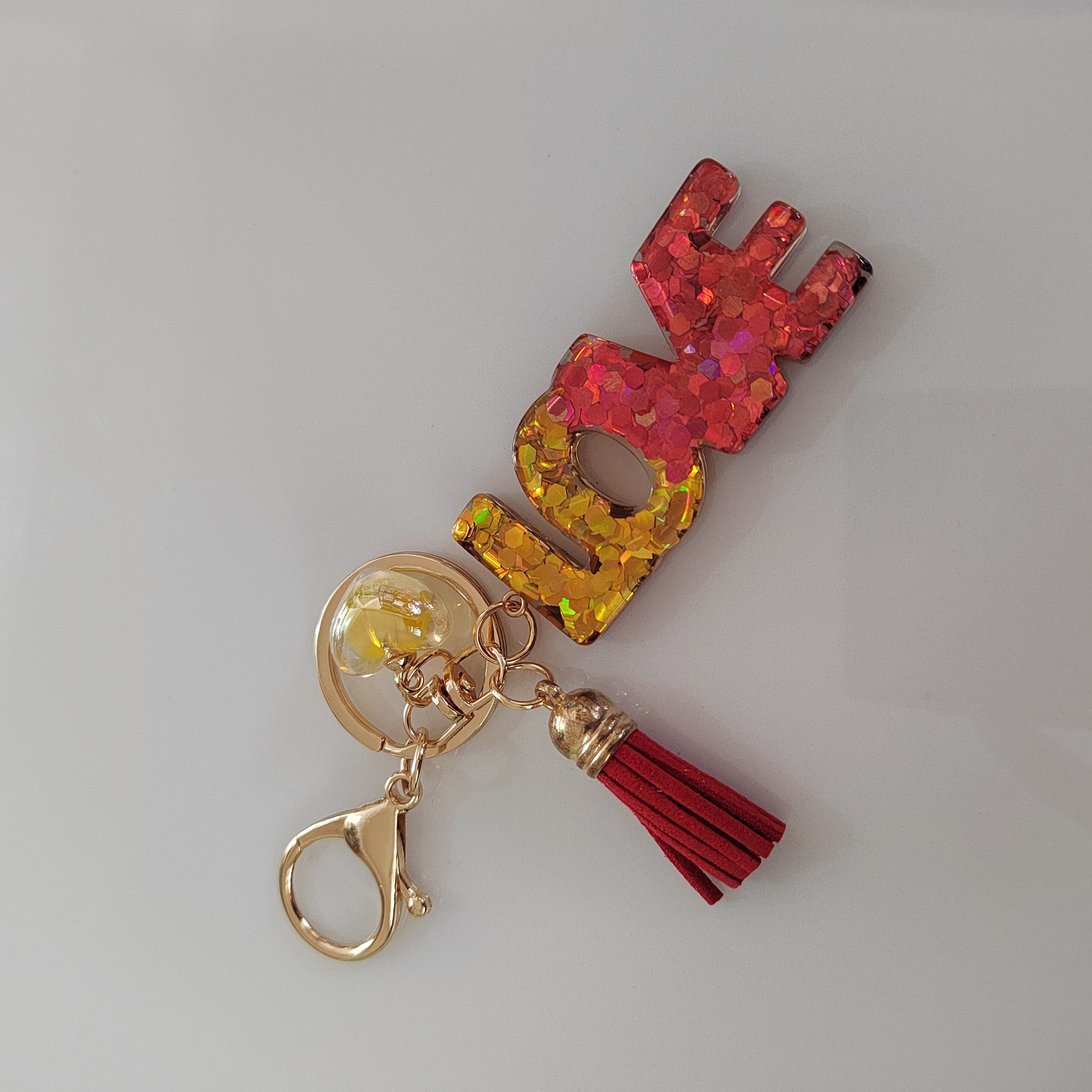 Wholesale Letter LOVE Tassel Sequin Drop Glue Resin Pendant Keychain
