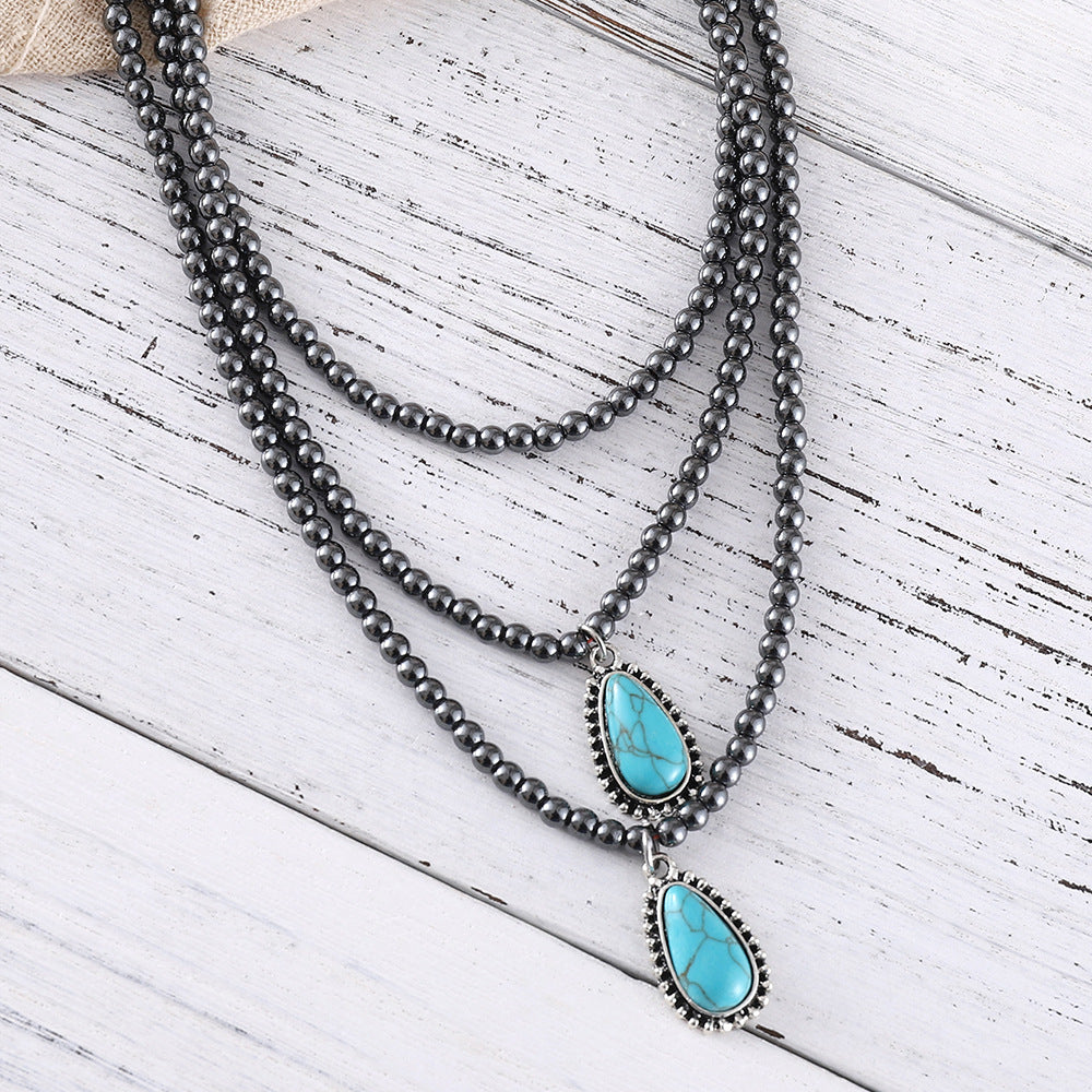 Wholesale Bohemian ethnic style three-layer teardrop-shaped turquoise black round bead necklace popular jewelry