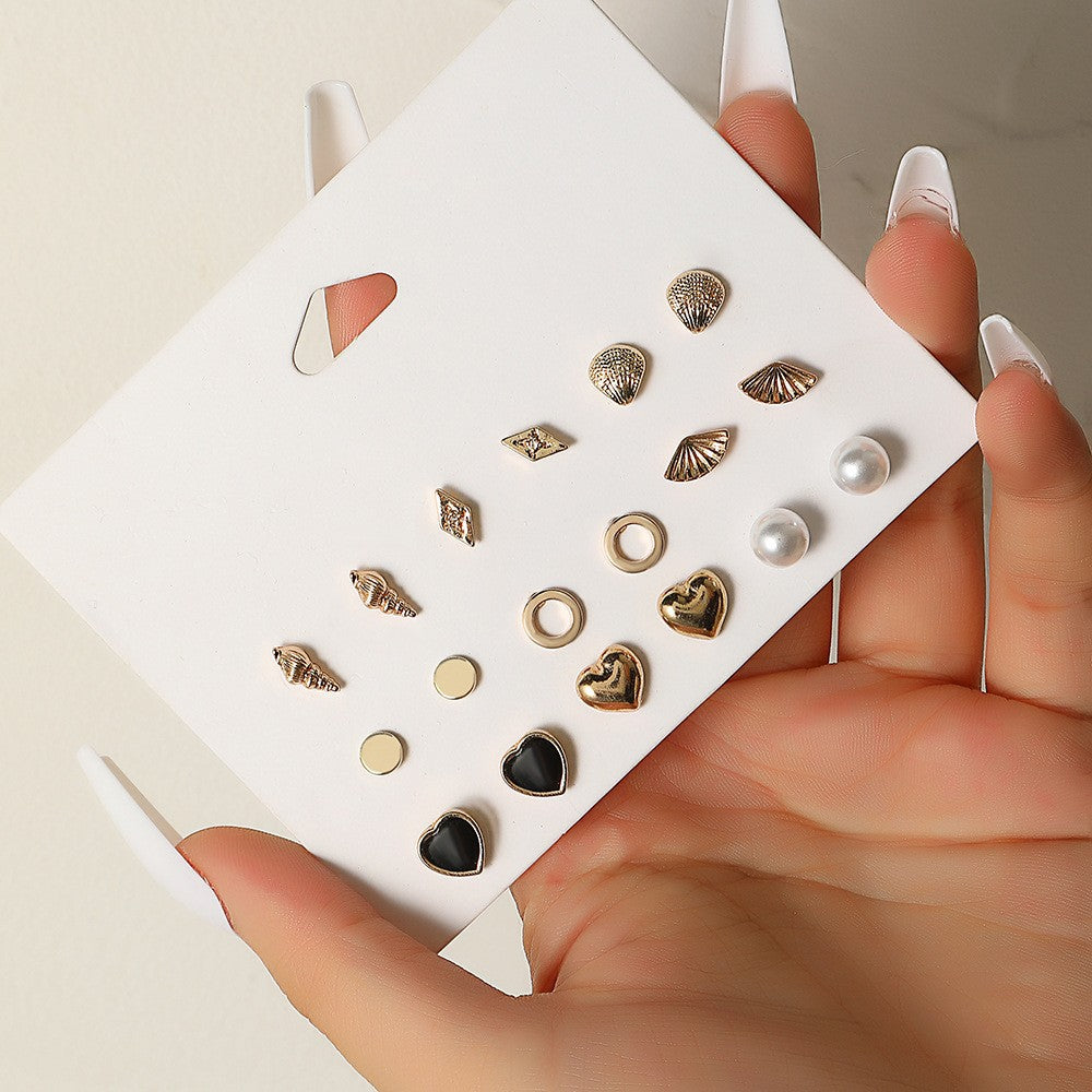 Pendientes de pernos pequeños de aleación al por mayor para pendientes de una semana