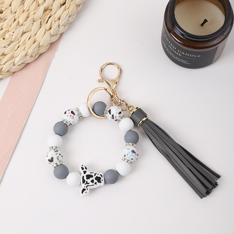 Llavero de muñeca de silicona de borla al por mayor