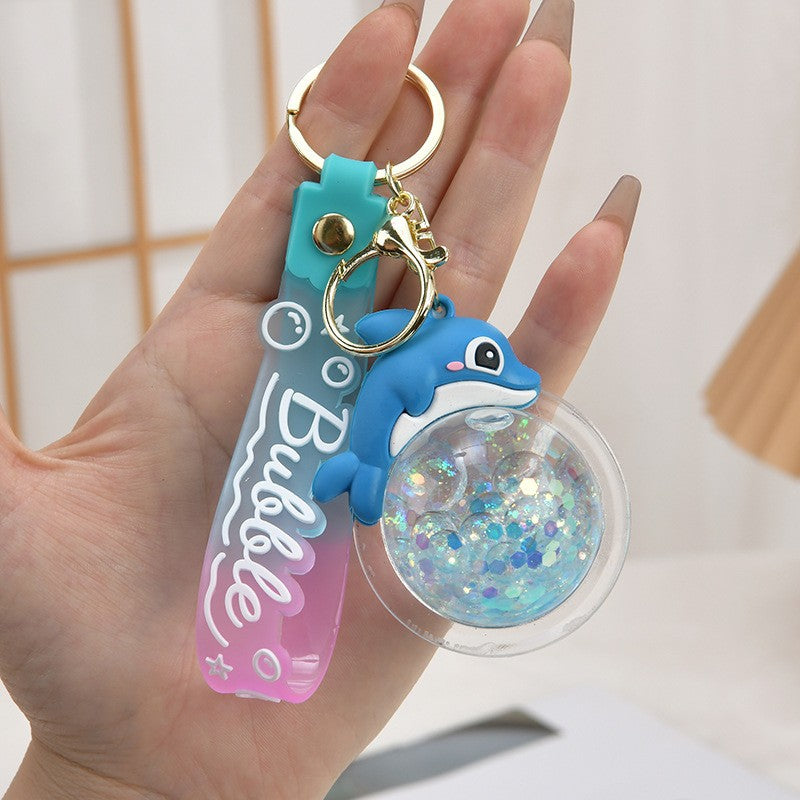 Wholesale Acrylic flowing sand bottle bag keychain