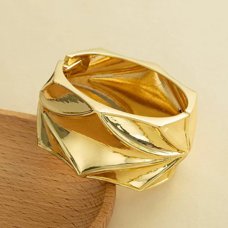 Wholesale Golden wide edged wave band exaggerated bracelet