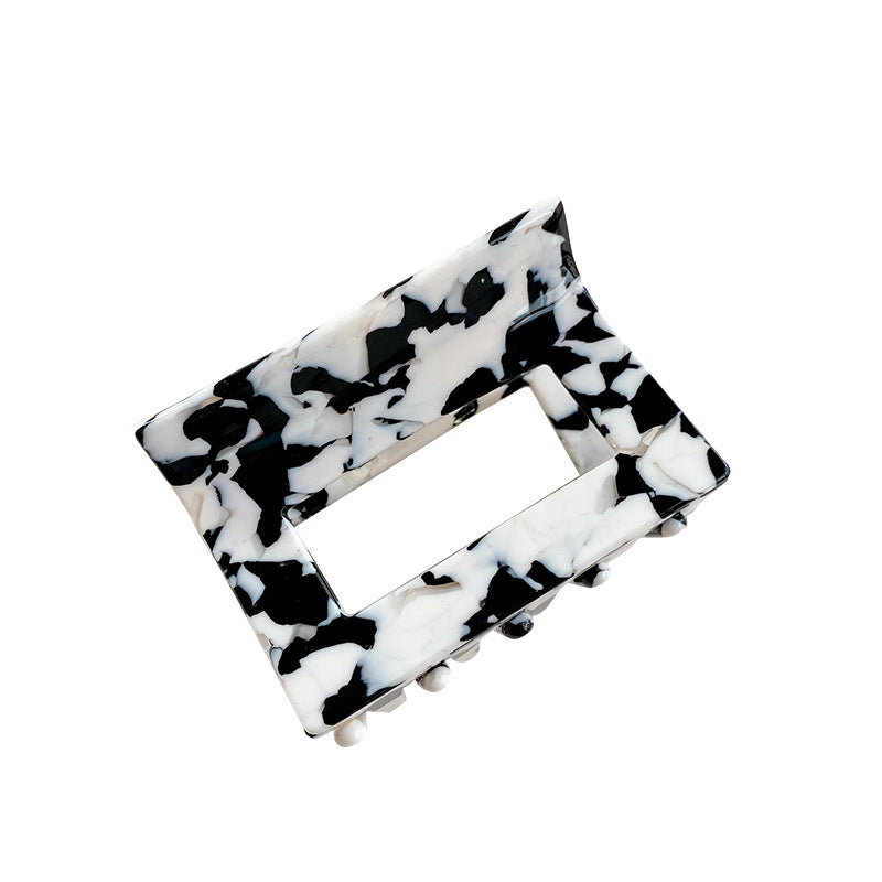 Wholesale Cow Black and White Medium Hollow Acetate Plate Hair Clips