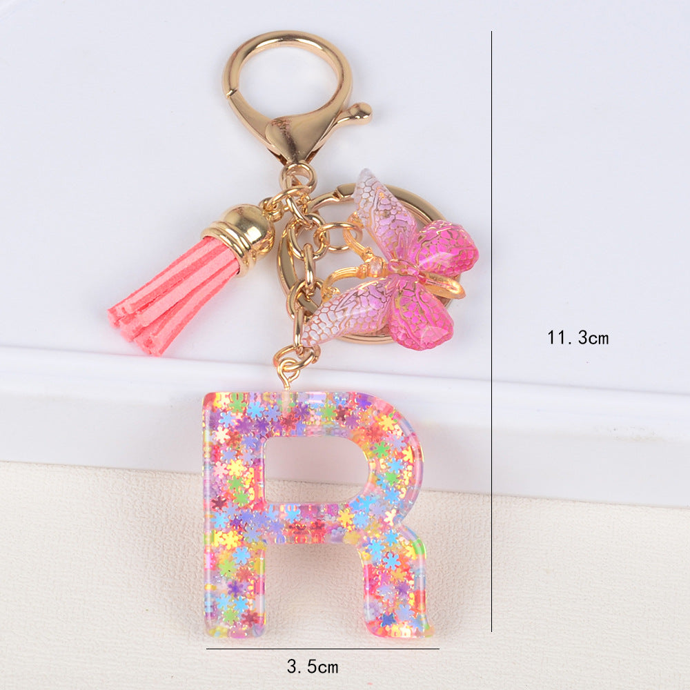 卸売スパンコールスノーフレークレター樹脂キーホルダー