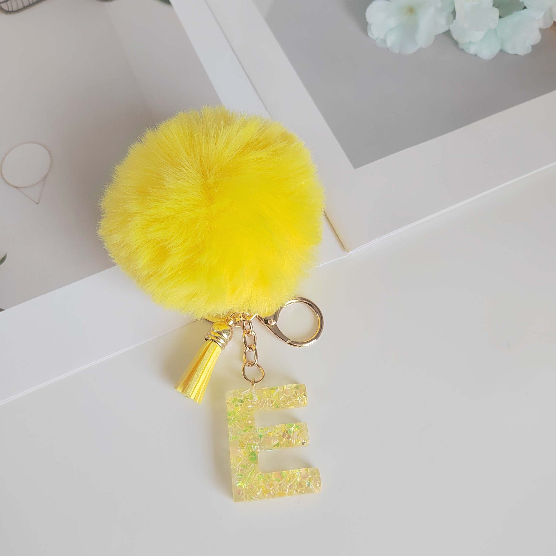 Wholesale Yellow letter ball pendant flower shaped letter keychain