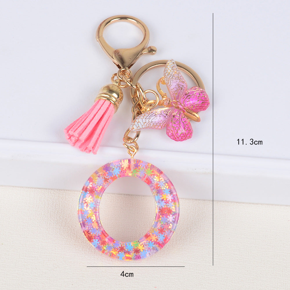 卸売スパンコールスノーフレークレター樹脂キーホルダー