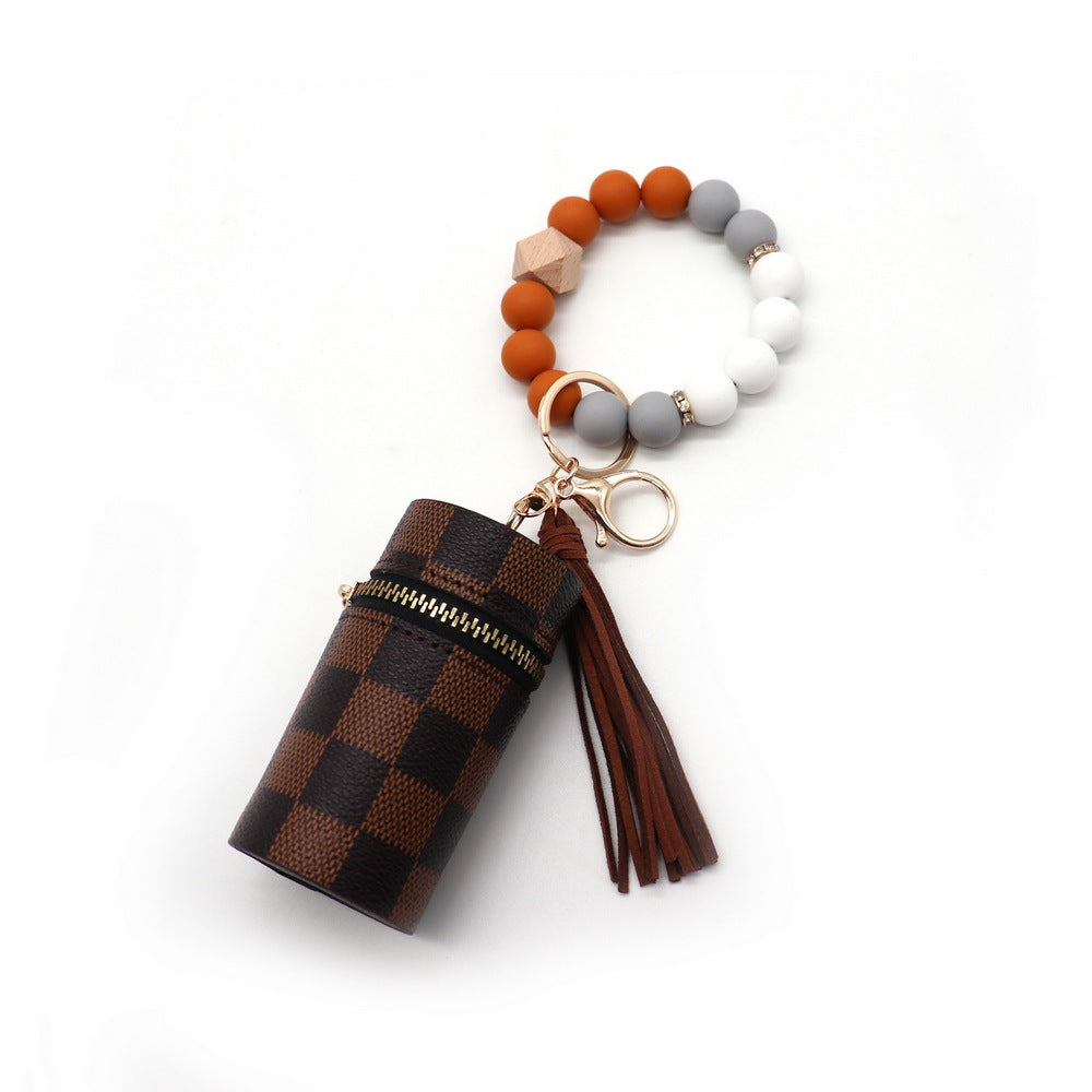 Wholesale Silicone Coin Purse Small Bag Mini Lipstick Earphone Keychain