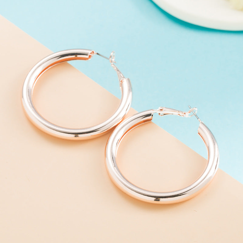 Wholesale Wind C-shaped Rose Gold Fashion Earrings