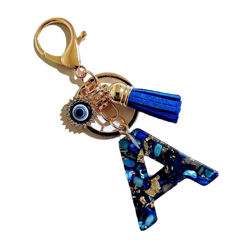 Wholesale Blue English letter Evil Eye tassel keychain