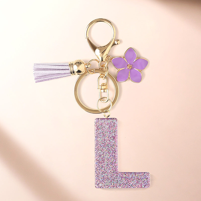 Wholesale Sparkling Pink 26 English Letter Purple Flower Keychain