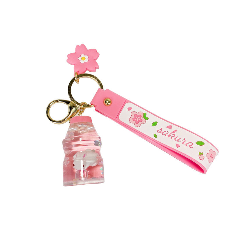 Wholesale Cherry Blossom Bunny Into Oil Milk Tea Cup Floating Bottle Acrylic Keychain