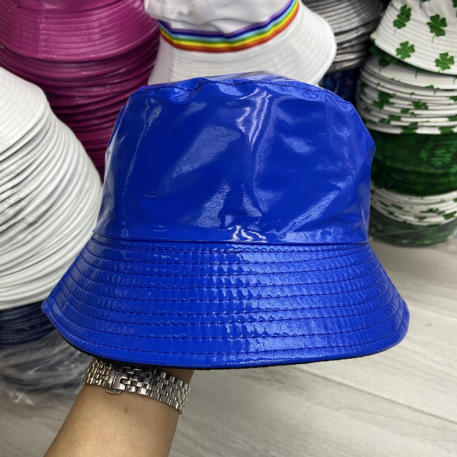 Wholesale of Solid Color Patent Leather with Polyester Fisherman Hats on Both Sides