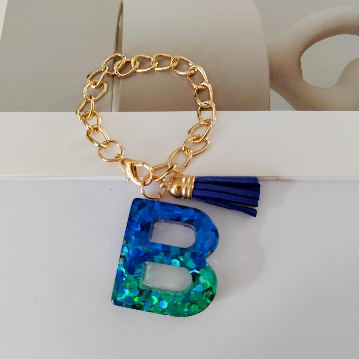 Wholesale Mixed color blue English letter keychain