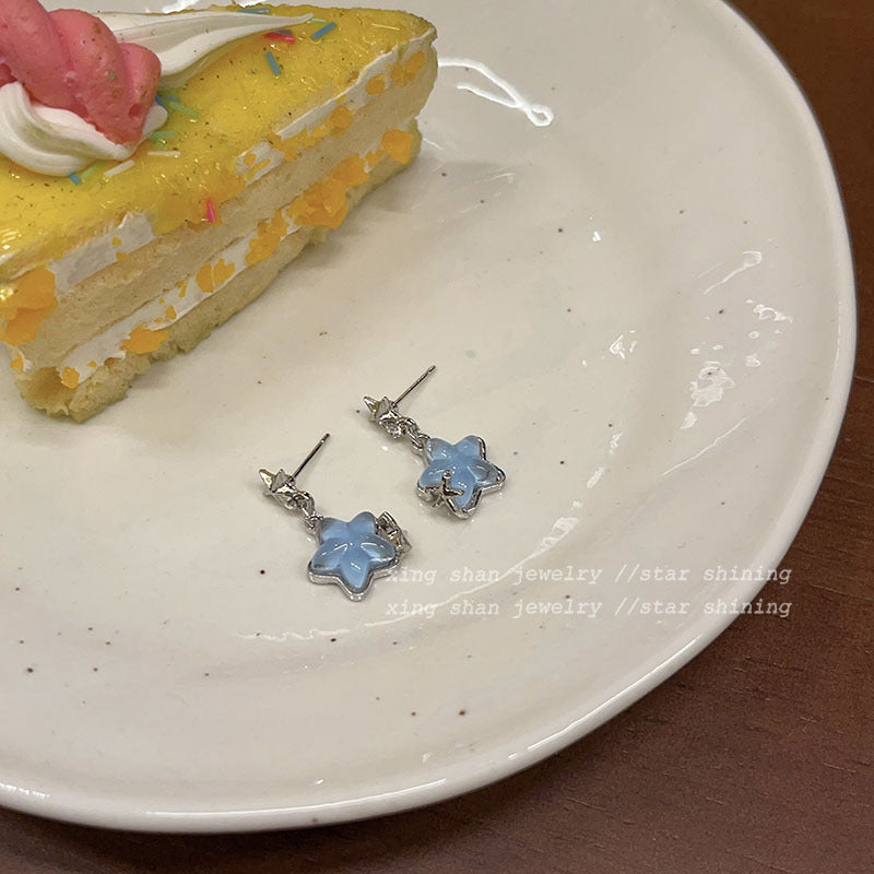 Pendientes de aleación de estrellas transparentes al por mayor