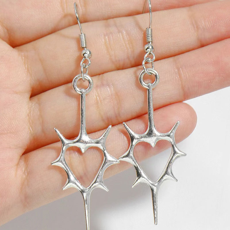 Wholesale Hollow pierced heart punk earrings