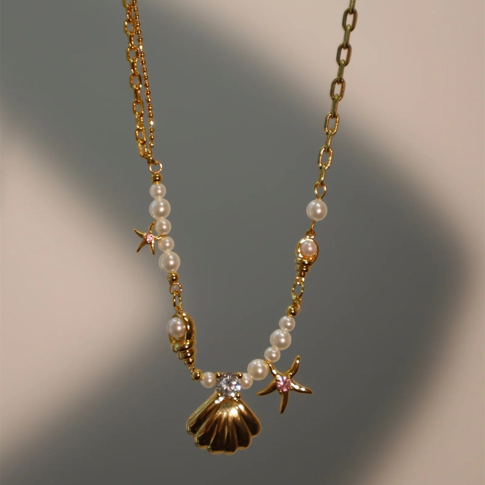 Wholesale Pearl Rice Pearl Star Mang Zircon Sea Star Shell Titanium Steel Necklace