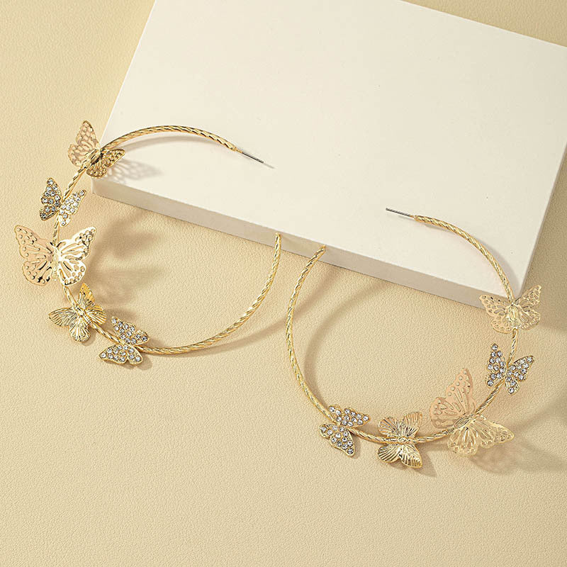 Pendientes de aleación de mariposas de diamantes al por mayor