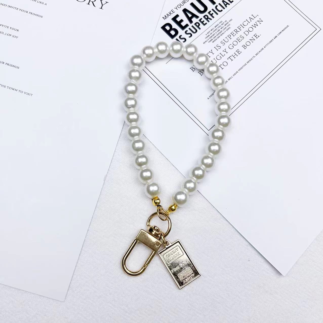 Wholesale Beauty Head Pearl Keychains