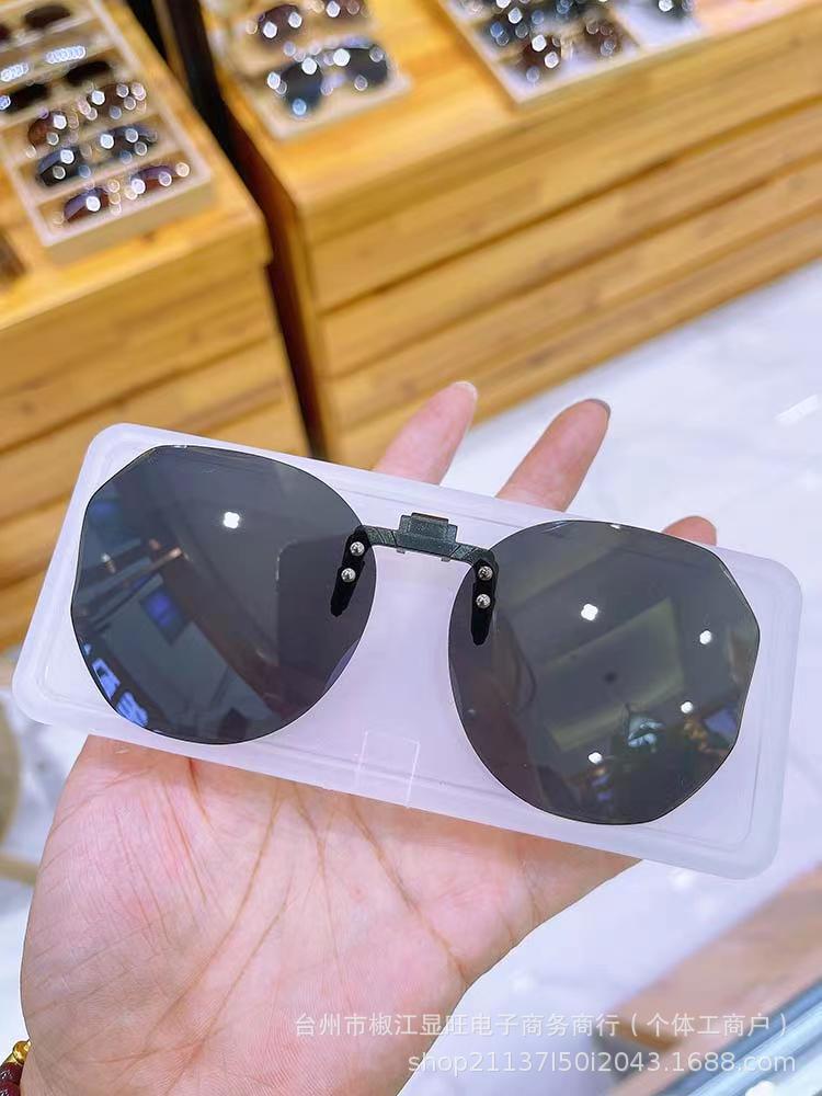 Wholesale Flip-up frameless round UV-proof sunglasses