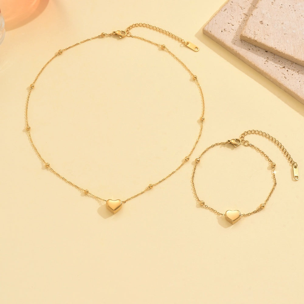 Wholesale Stainless steel gold heart shaped necklace and bracelet