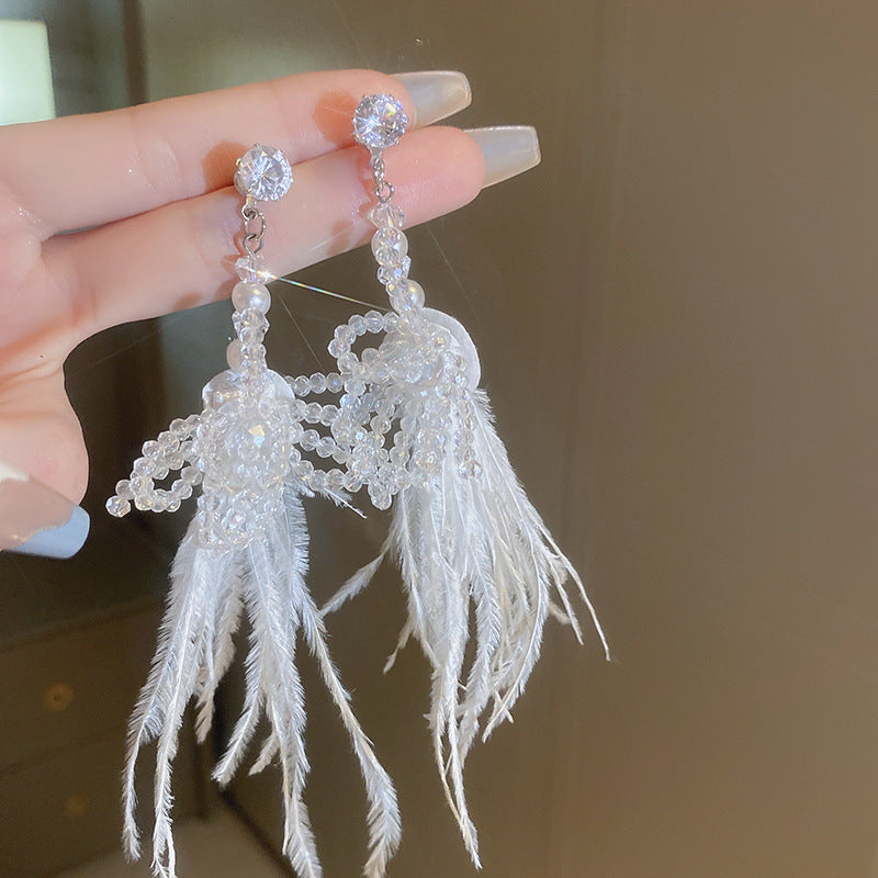 Wholesale Diamond studded bow feather tassel earrings