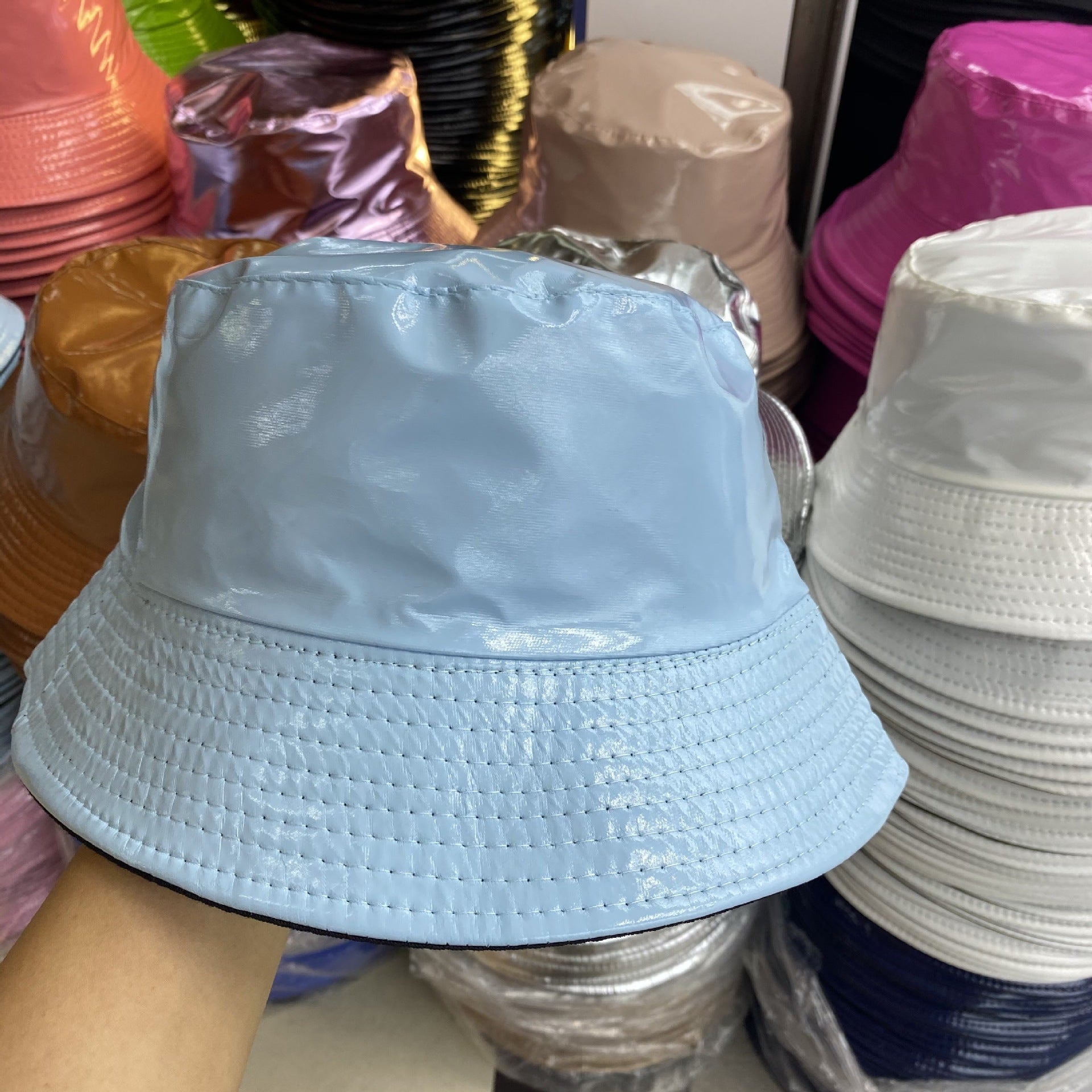 Wholesale of Solid Color Patent Leather with Polyester Fisherman Hats on Both Sides