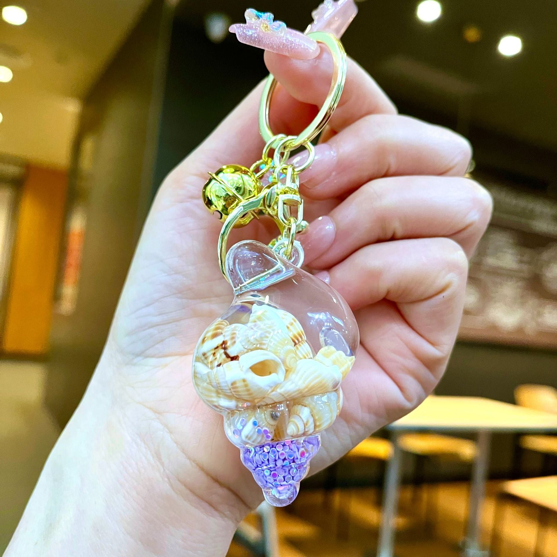 Wholesale Colorful flowing sand seashell DIY insert oil keychain