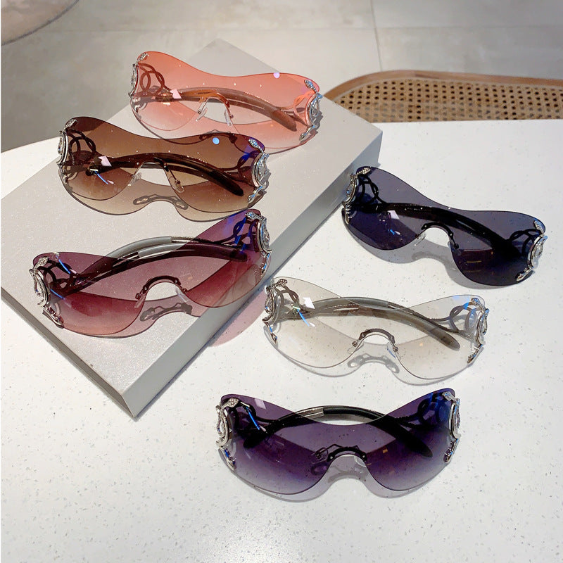 Wholesale Frameless one-piece snake temple sunglasses
