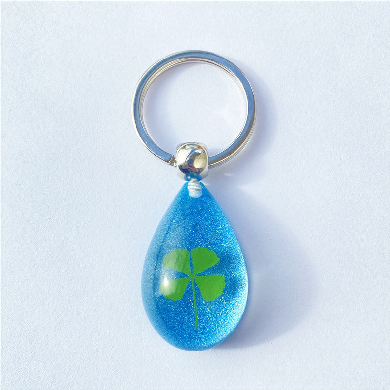 Wholesale 12pcs Four-leaf Clover Luminous Keychain
